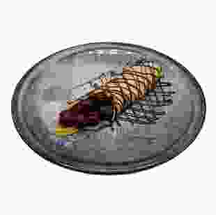 Млинець з вишнею в шоколадному соусі